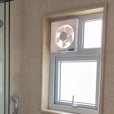 Clean residential room air vent with fan near window for improved indoor air quality in Appleton home.