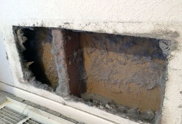 Interior view of residential air duct with mold contamination emphasizing vent cleaning and mold prevention in Milwaukee WI.