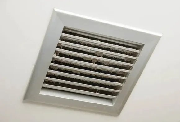 HEPA-certified air duct cleaning service showing clean wall vent grille in West Bend WI.