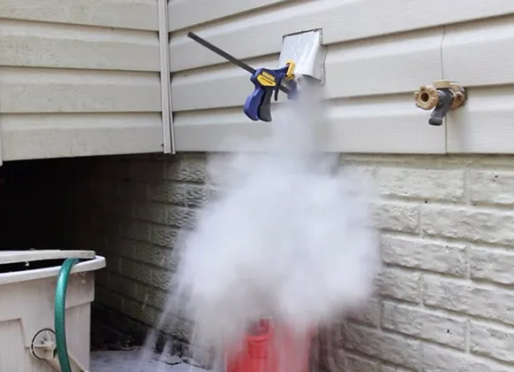 Professional clogged dryer vent cleaning with steam cleaning equipment in Manitowoc WI.